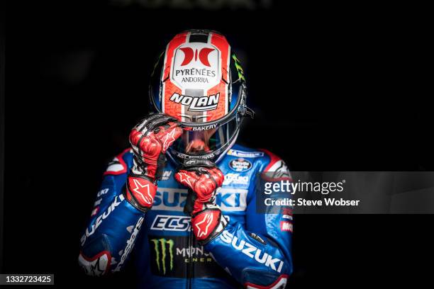 Alex Rins of Spain and Team SUZUKI ECSTAR closes his visor on his helmet during the free practice session of the MotoGP Michelin Grand Prix of Styria...