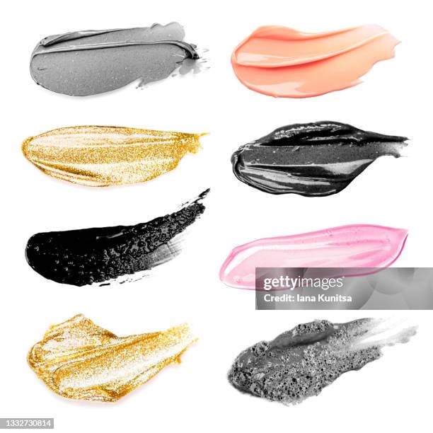 set of cosmetic smears for skin care and makeup. clay black face mask, gold mask, pink face serum and face cream. collection of beauty products. - lipstick smudge imagens e fotografias de stock