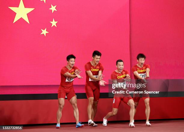 Members of Team China pose together before competing in the men's 4x100m relay final on day fourteen of the Tokyo 2020 Olympic Games at Olympic...