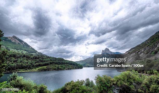 scenic view of lake and mountains against sky,lanuza,huesca,spain - huesca province stock pictures, royalty-free photos & images