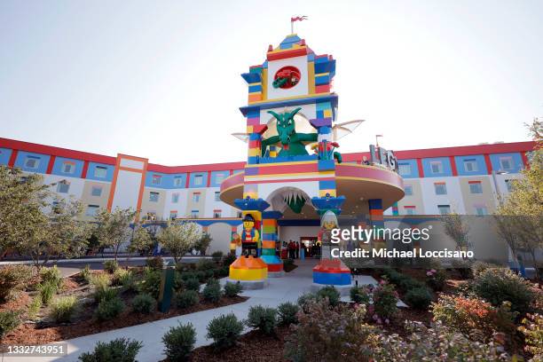 Character dragon greets guests from a tower at the front entrance to the LEGOLAND New York Hotel during its grand opening at the LEGOLAND Resort on...
