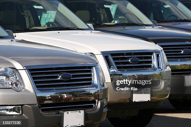 car dealership - sports utility vehicle stock pictures, royalty-free photos & images