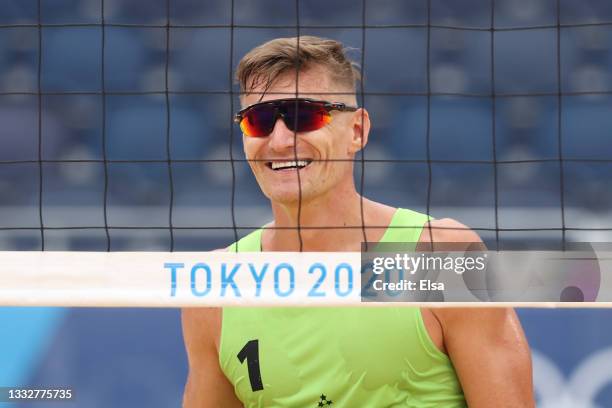 Martins Plavins of Team Latvia smiles while competing against Team Qatar during the Men's Bronze Medal Match on day fifteen of the Tokyo 2020 Olympic...