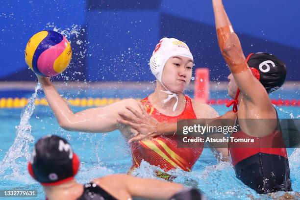 Guannan Niu of Team China is blocked by Gurpreet Sohi of Team Canadaduring the Women’s Classification 7th-8th match between China and Canada on day...