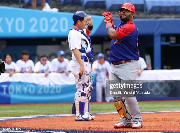 Infielder Juan Francisco of Team Dominican Republic celebrates hitting a solo home run in the first inning against Dominican Republic during the...