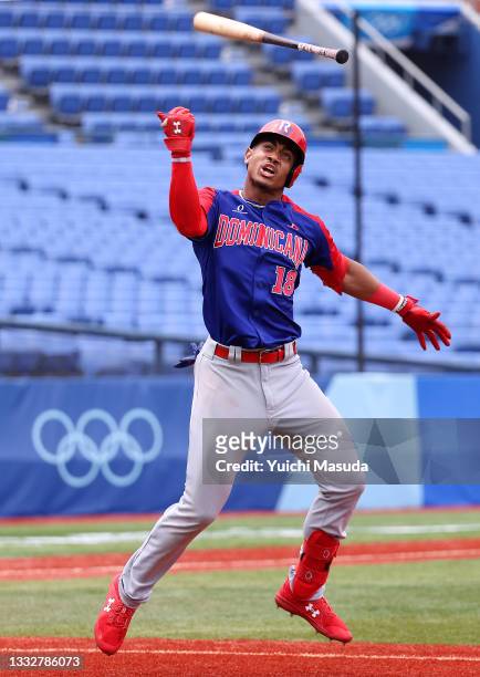 Outfielder Julio Rodriguez of Team Dominican Republic celebrates hitting a two-run home run in the first inning against Team Republic of Korea during...