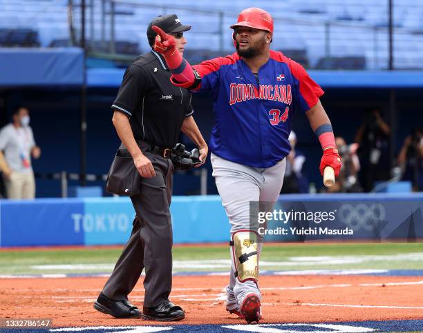 Infielder Juan Francisco of Team Dominican Republic celebrates hitting a solo home run in the first inning against Team Republic of Korea during the...