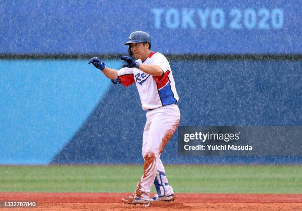 Outfielder Hyunsoo Kim of Team Republic of Korea reacts after hitting a double in the second inning against Dominican Republic during the bronze...