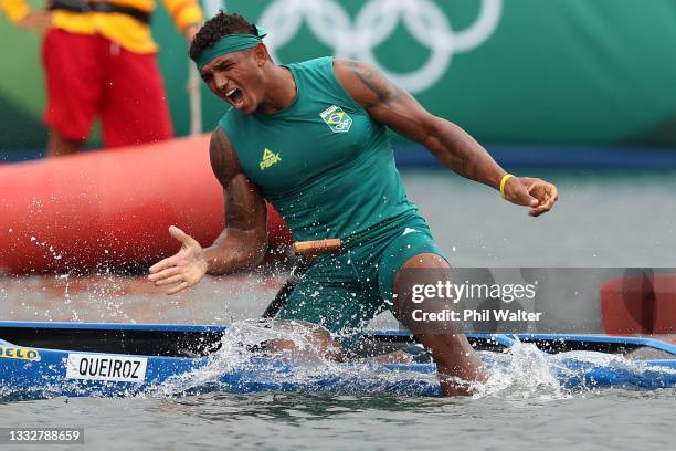 Isaquias Queiroz dos Santos of Team Brazil celebrates winning the gold medal in the Men's Canoe Single 1000m Final A on day fifteen of the Tokyo 2020...