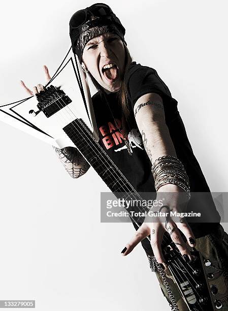 Portrait of Alexi Laiho, frontman of Finnish metal group Children Of Bodom, taken on December 7, 2010 in London. Laiho is posing with his signature...