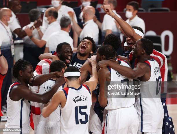 Team United States celebrates following their victory over France in the Men's Basketball Finals game on day fifteen of the Tokyo 2020 Olympic Games...