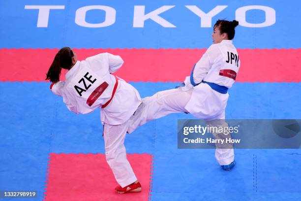 Ayumi Uekusa of Team Japan competes against Irina Zaretska of Team Azerbaijan during the Women’s Karate Kumite +61kg Elimination Round contest on day...