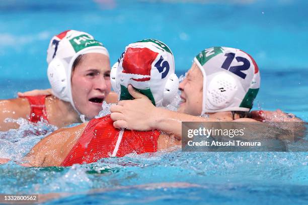 To R, Anna Illes, Gabriella Szucs and Krisztina Garda of Team Hungary celebrate the win during the Women’s Bronze Medal match between Hungary and...