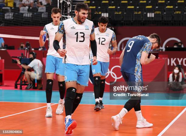 Agustin Loser, Ezequiel Palacios, Bruno Lima and Santiago Danani of Team Argentina celebrate after winning the fourth set against Team Brazil during...