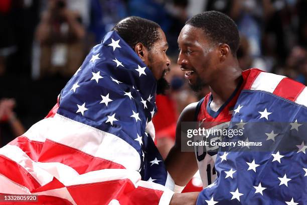 Bam Adebayo of Team United States hugs teammate Kevin Durant following the United States' victory over France in the Men's Basketball Finals game on...