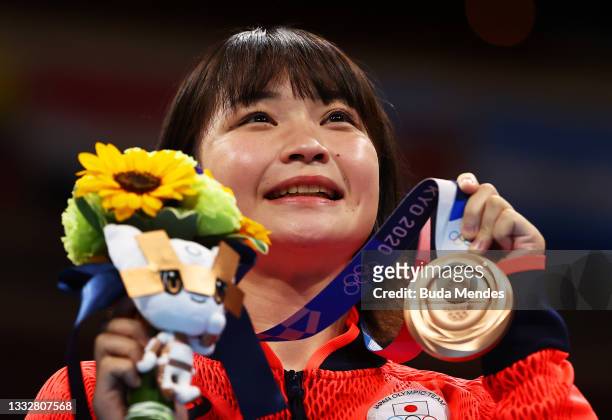 Tsukimi Namiki of Team Japan poses for a photo with her bronze medal during the medal ceremony for the Women's Fly on day fifteen of the Tokyo 2020...