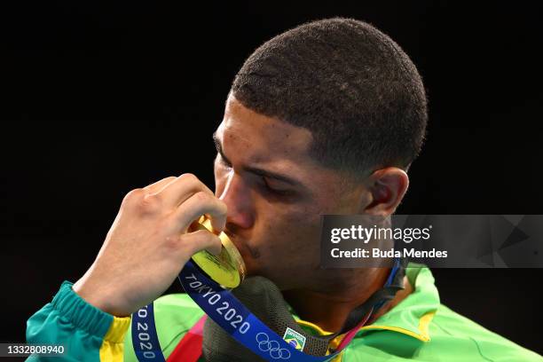 Herbert Sousa of Team Brazil poses for a photo with his gold medal during the medal ceremony for the Men's Middle on day fifteen of the Tokyo 2020...