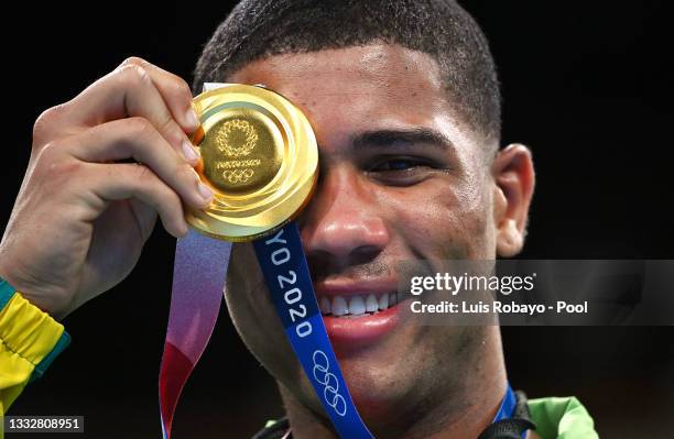 Herbert Sousa of Team Brazil poses for a photo with his gold medal during the medal ceremony for the Men's Middle on day fifteen of the Tokyo 2020...