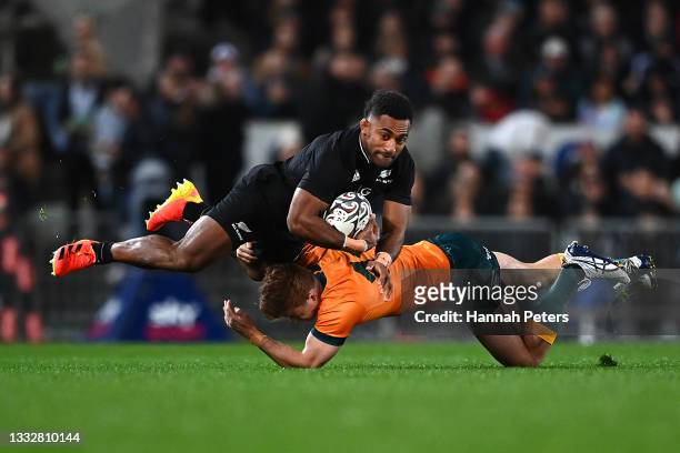 Sevu Reece of the All Blacks is tackled by Andrew Kellaway of the Wallabies during the Rugby Championship and Bledisloe Cup match between the New...