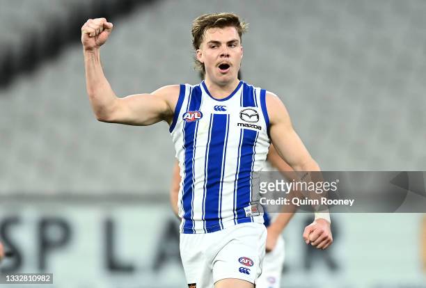 Cameron Zurhaar of the Kangaroos celebrates kicking a goal during the round 21 AFL match between Richmond Tigers and North Melbourne Kangaroos at...