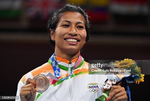 Lovlina Borgohain of Team India poses for a photo with her bronze medal during the medal ceremony for the Women's Welter on day fifteen of the Tokyo...