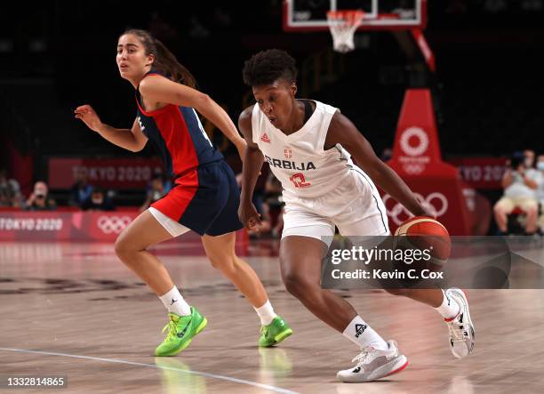 Yvonne Anderson of Team Serbia drives to the basket against Marine Fauthoux of Team France during the second half of a Women's Basketball Bronze...
