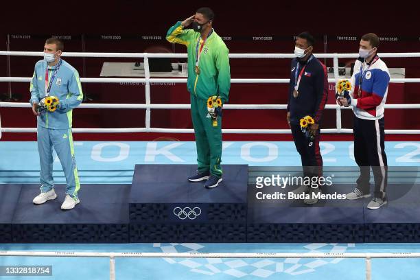 Silver medalist Oleksandr Khyzhniak of Team Ukraine, gold medalist Herbert Sousa of Team Brazil, bronze medalists Eumir Marcial of Team Philippines...