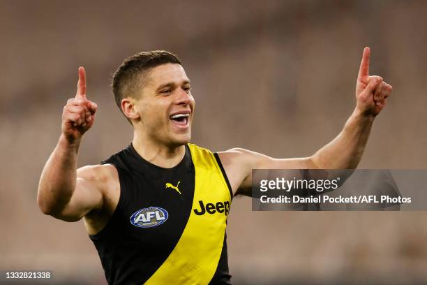 Dion Prestia of the Tigers celebrates a goal during the round 21 AFL match between Richmond Tigers and North Melbourne Kangaroos at Melbourne Cricket...