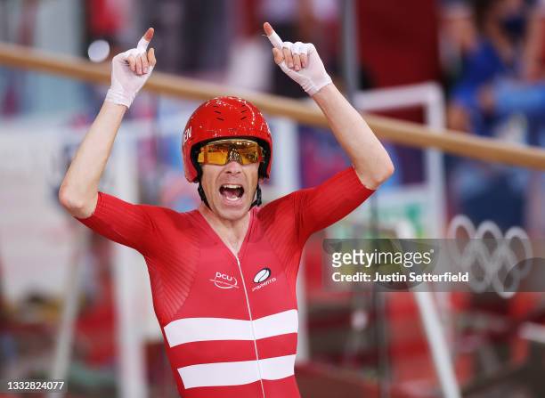 Michael Morkov of Denmark celebrates winning the gold medal during the Men's Madison final of the track cycling on day filthen of the Tokyo 2020...