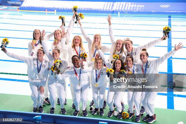 Gold medalists Team United States pose after receiving their medals during the Women's Gold Medal match between Spain and the United States on day...