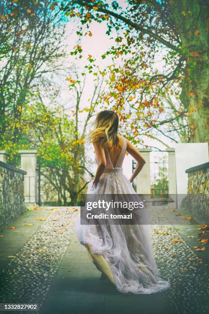 bride running away from the wedding - bride running stock pictures, royalty-free photos & images