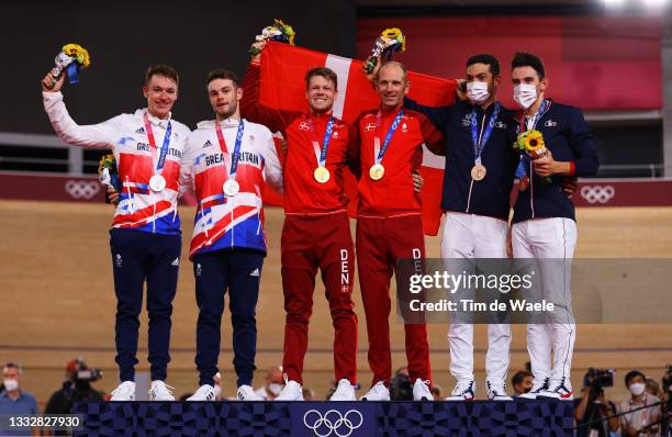 Silver medalists Ethan Hayter and Matthew Walls of Team Great Britain, gold medalists Lasse Norman Hansen and Michael Morkov of Denmark, and bronze...