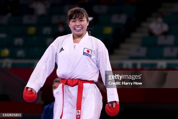 Ayumi Uekusa of Team Japan reacts to winning a point against Sofya Berultseva of Team Kazakhstan during the Women’s Karate Kumite +61kg Elimination...
