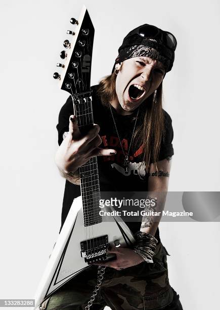 Portrait of Alexi Laiho, frontman of Finnish metal group Children Of Bodom, taken on December 7, 2010 in London. Laiho is posing with his signature...