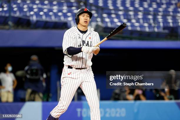 Outfielder Yuki Yanagita of Team Japan strikes out in the second inning against Team United State during the gold medal game between Team United...