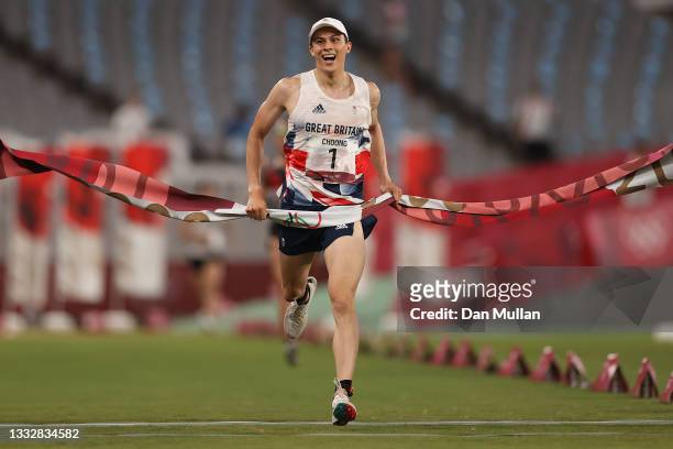Joseph Choong of Team Great Britain celebrates victory in the Laser Run and winning the gold medal of the Men's Modern Pentathlon on day fifteen of...