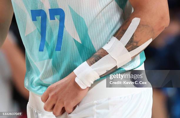 Detail photograph of the injured arm of Luka Doncic during the Men's Basketball Bronze medal game between Team Slovenia and Team Australia on day...