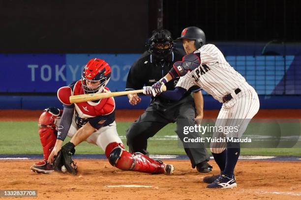 Infielder Ryosuke Kikuchi of Team Japan strikes out in the fourth inning against team United States during the gold medal game between Team United...