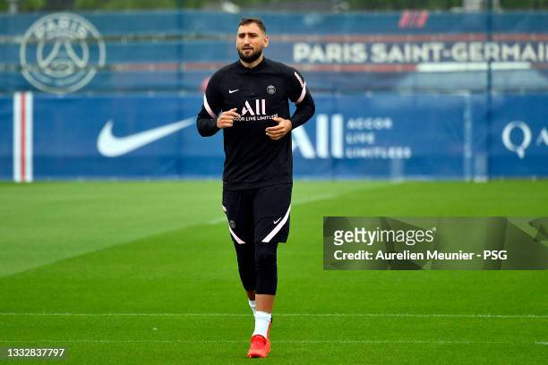 Gianluigi Donnarumma warms up during a Paris Saint-Germain training session at Ooredoo center on August 07, 2021 in Paris, France.