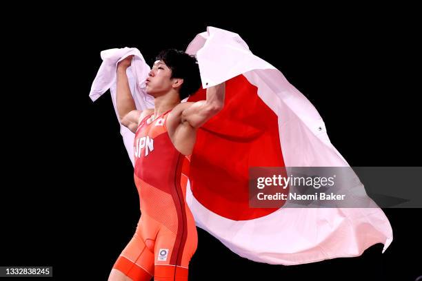 Takuto Otoguro of Team Japan celebrates victory over Haji Aliyev of Team Azerbaijan during the Men's Freestyle 65kg Final on day fifteen of the Tokyo...