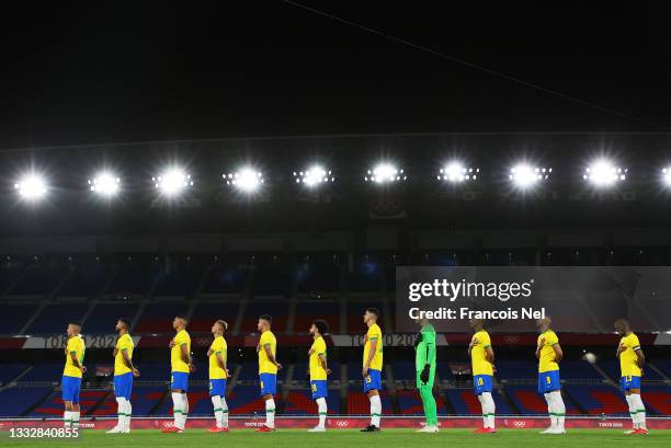 Players of Team Brazil stand for the national anthem prior to the Men's Gold Medal Match between Brazil and Spain on day fifteen of the Tokyo 2020...