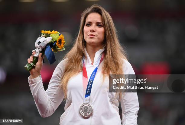 Silver medalist Maria Andrejczyk of Team Poland stands on the podium during the medal ceremony for the Women’s Javelin Throw on day fifteen of the...