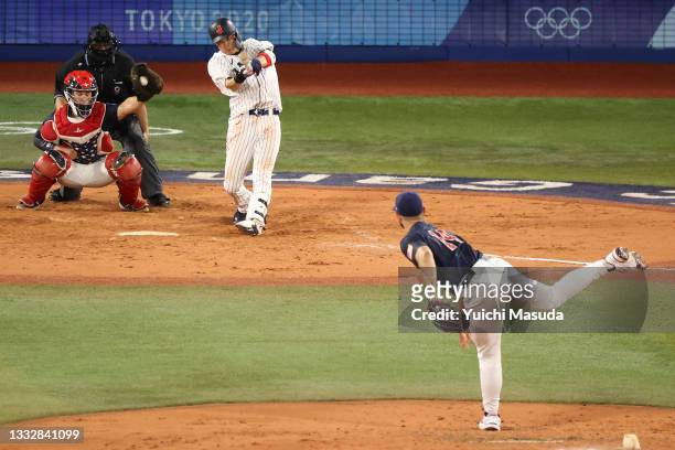 Designated hitter Tetsuto Yamada of Team Japan strikes out in the fifth inning against Team United States during the gold medal game between Team...
