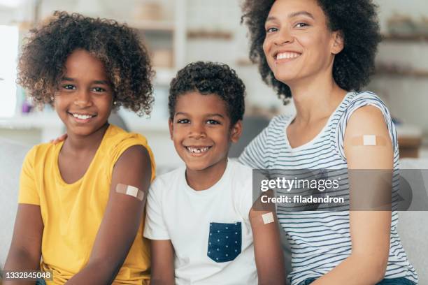 vaccinated family - name patch stock pictures, royalty-free photos & images