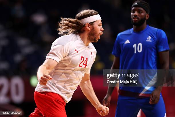 Mikkel Hansen of Team Denmark celebrates after scoring a goal during the Men's Gold Medal handball match between France and Denmark on day fifteen of...