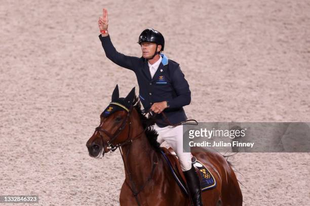 Peder Fredricson of Team Sweden riding All In celebrates winning gold in the Jumping Team Final at Equestrian Park on August 07, 2021 in Tokyo, Japan.