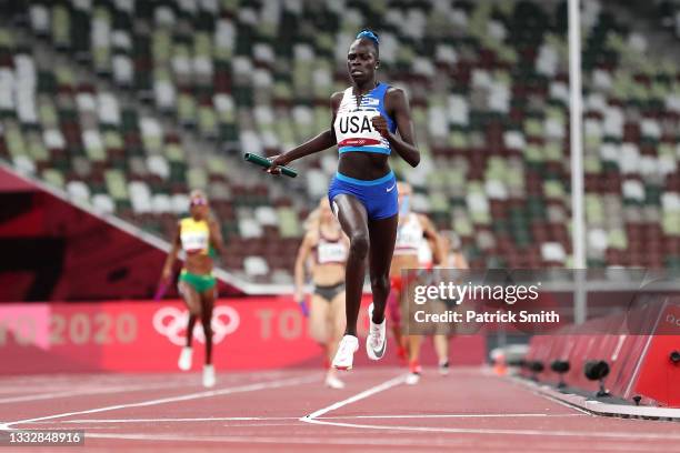 Athing Mu of Team United States crosses the finish line winning the gold medal in the Women' s 4 x 400m Relay Final on day fifteen of the Tokyo 2020...