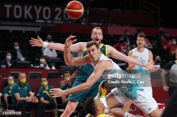 Joe Ingles of Team Australia reacts as Vlatko Cancar of Team Slovenia charges into Dante Exum during the second half of the Men's Basketball Bronze...