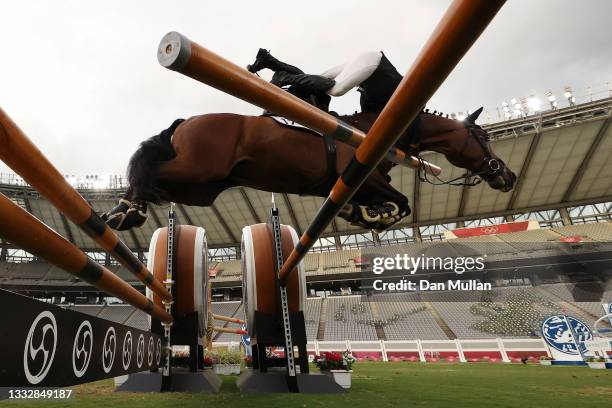 Charles Fernandez of Team Guatemala collides with a jump in the Riding Show Jumping of the Men's Modern Pentathlon on day fifteen of the Tokyo 2020...