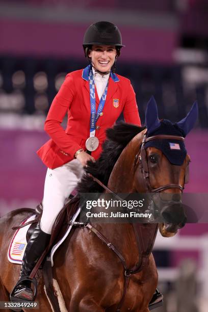 Silver medalist Jessica Springsteen of Team United States celebrates following the Jumping Team Final at Equestrian Park on August 07, 2021 in Tokyo,...